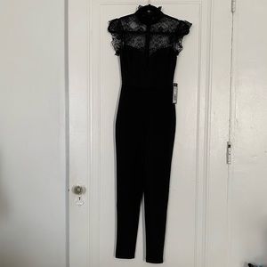 NWT. Bebe Black jumpsuit